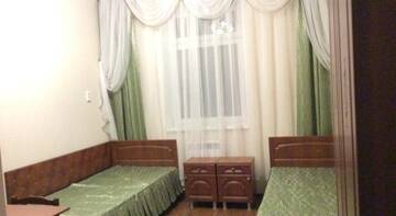 Фото номера Улучшенный двухместный номер с 2 отдельными кроватями Гостиница Березовая Роща г. Ялуторовск 2